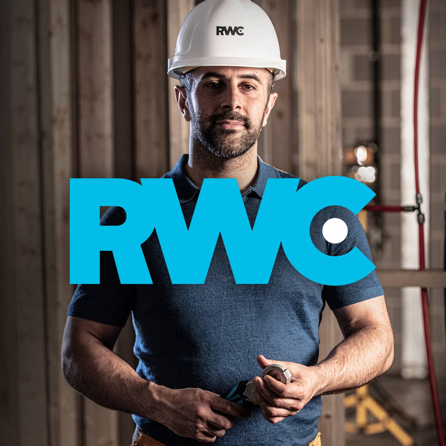 A hero shot of a plumber/workman, with an overlaid graphic reading 'RWC'